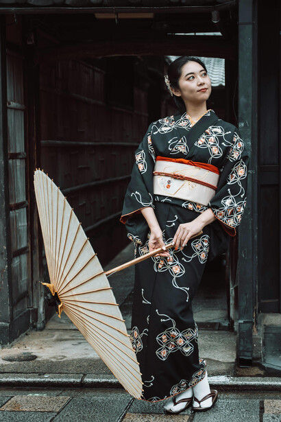 Wearing a kimono can be time-consuming to put on, restrictive for physical work, and less suited to fast-paced urban life
