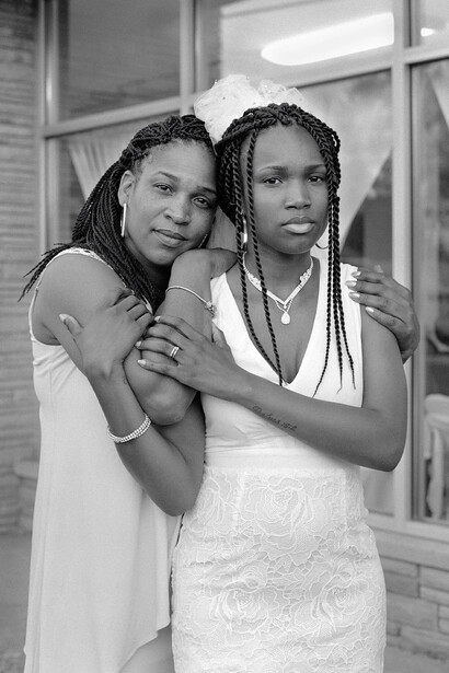 LaToya Ruby Frazier, Andrea holding her daughter Nephratiti outside the Social Network Banquet Hall, Flint, Michigan, 2016-2017. Courtesy of Timothy Taylor Gallery
