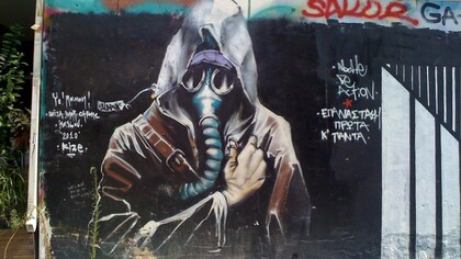 Atenas. Grafiti que reza "la revolución está llegando"