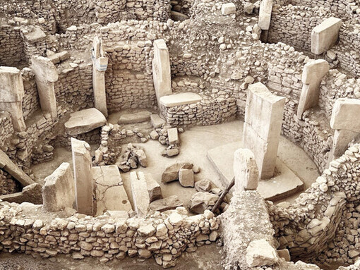 Göbekli Tepe, a Neolithic archaeological site in Upper Mesopotamia (al-Jazira), modern-day Turkey, was occupied from around 9500 BCE to at least 8000 BCE, during the Pre-Pottery Neolithic era