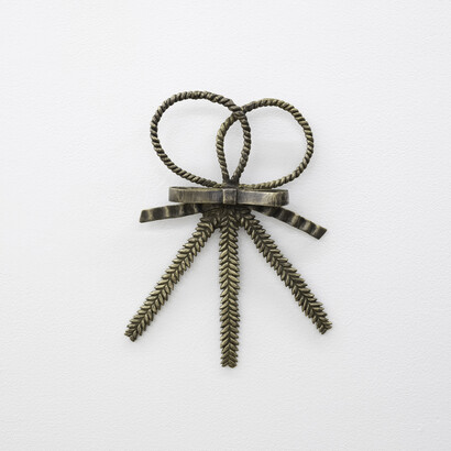 Maggie Dunlap,
Crying The Neck, 2024,
brass,
12 x 10 x 2 in.,
30.48 x 25.4 x 5.08 cm. Courtesy of the artist and No Gallery