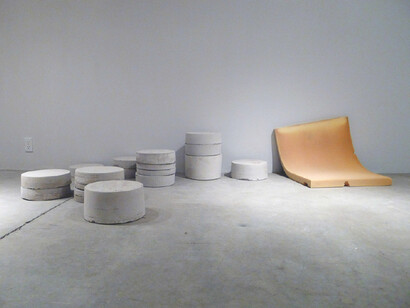 Valérie Kolakis, Untitled (Casts and Cushion), 2012, Cement casts of buckets and remnant sofa cushion
Dimensions variable