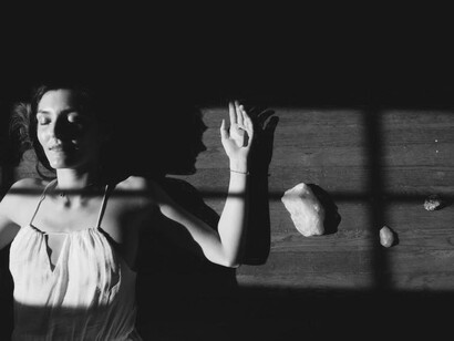 A woman in a state of consciousness due to her holotropic breathwork exercises
