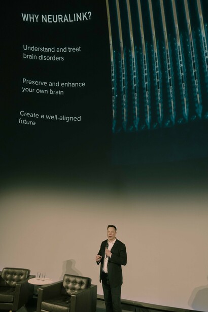 Elon Musk promoting Neuralink; Musk aims to ensure that AI serves as a tool for enhancing human life rather than a threat to its existence