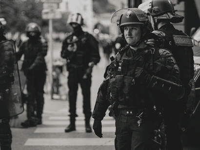 Policemen wearing protective gear