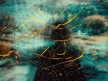 Capturing serenity, person's silhouette amidst green and yellow water droplets on glass