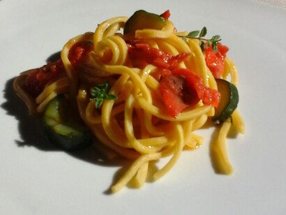 Bigoli con trota, zucchine e menta