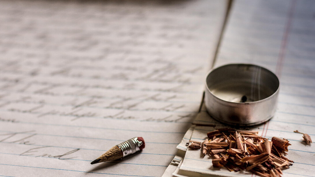 Lápiz consumido de tanto escribir