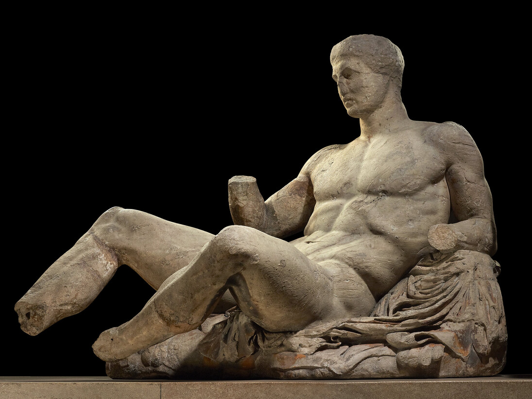 A figure of a naked man, possibly Dionysos. Marble statue from the East pediment of the Parthenon. Designed by Phidias, Athens, Greece, 438BC-432BC. © The Trustees of the British Museum
