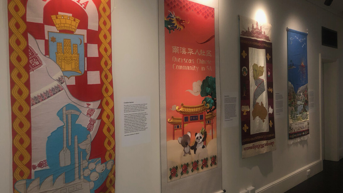 Aussies! The Migration Museum Banners Project, exhibition view. Courtesy of Migration Museum