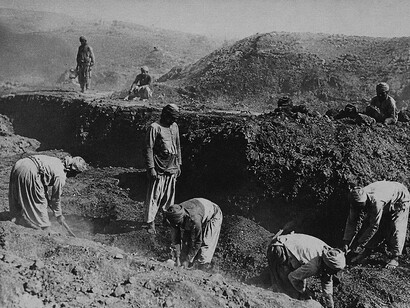 Early 20th-century excavations at Oxyrhynchus, Egypt, around 1903, where archaeologists uncovered a vast collection of ancient papyri and literary texts