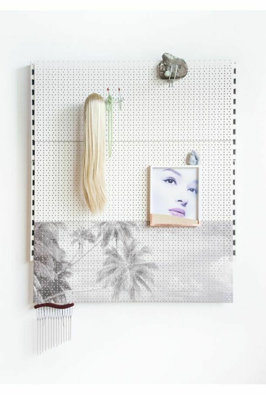 Gabrielle Beveridge, Post exertion visibility printed advertisement, 2013, crystal, wig, glass, wind chime, rock, pegboard, pegs, artist frame