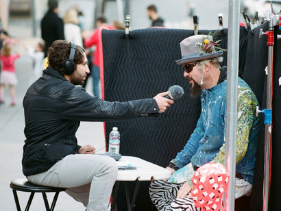  Eyal Levy interviewing a mural subject in San Francisco, 2018; photo: Marc Azoulay, courtesy JR-art.net