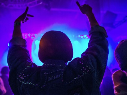 People partying to the tunes of Zero T in a club