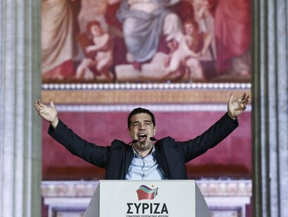 Alexis Tsipras, leader of left-wing party Syriza, speaks to his supporters outside Athens University Headquarters, on Jan. 25, 2015. Associated Press