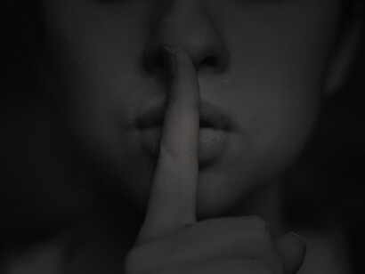 A woman silencing herself. The reality is that most of us were grown up in highly censored environments