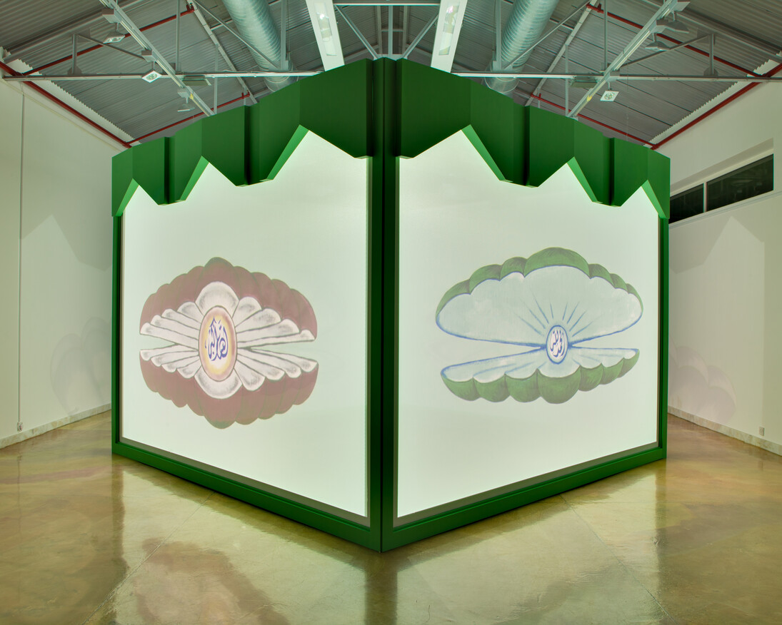 Monira Al Qadiri, Muhawwil (Transformer), 2014. 4-channel video installation with wooden structure. 4 x 3 x 4 meters. Courtesy the artist. 