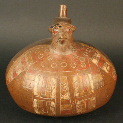 Botella asa puente

Materiales: Cerámica

Formativo Tardío. 200 - 600 a.C. Ocucaje Fase 7.

Medidas: 167 mm de alto