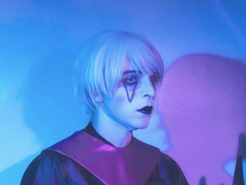 The interplay of shadow and light creates a hypnotic vision of Drab Majesty, reflecting the spectral, transcendent themes of their music