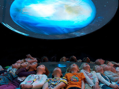 The Cosmos and the Solar System. Courtesy of Museum für Naturkunde