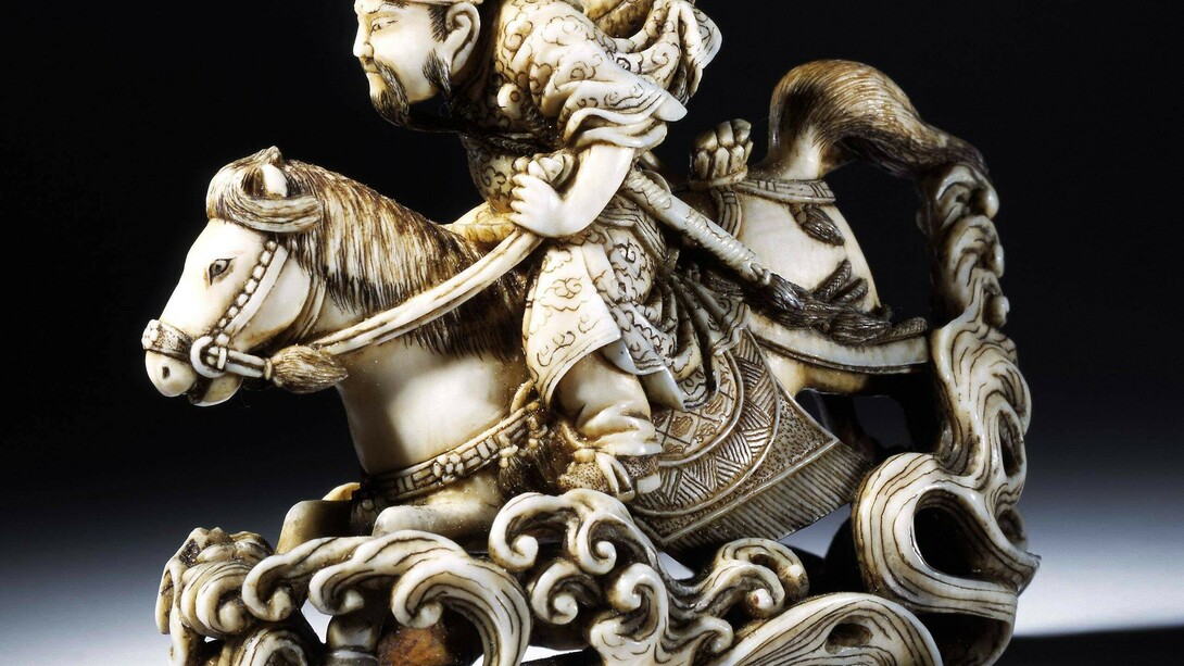 Netsuke of the Chinese General Gentoku riding across a river, carved ivory, signed Rakueisai, ca. 1850 – 1900, Japan. Museum no. A.781-1910. © Victoria and Albert Museum, London