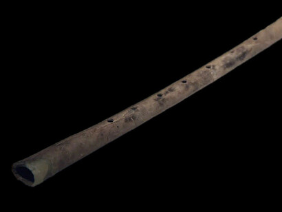 A Neolithic bone flute from the Peiligang Culture, discovered in Wuyang, Henan, in 1987, is one of the earliest known musical instruments. It is housed in the National Museum of China, Beijing