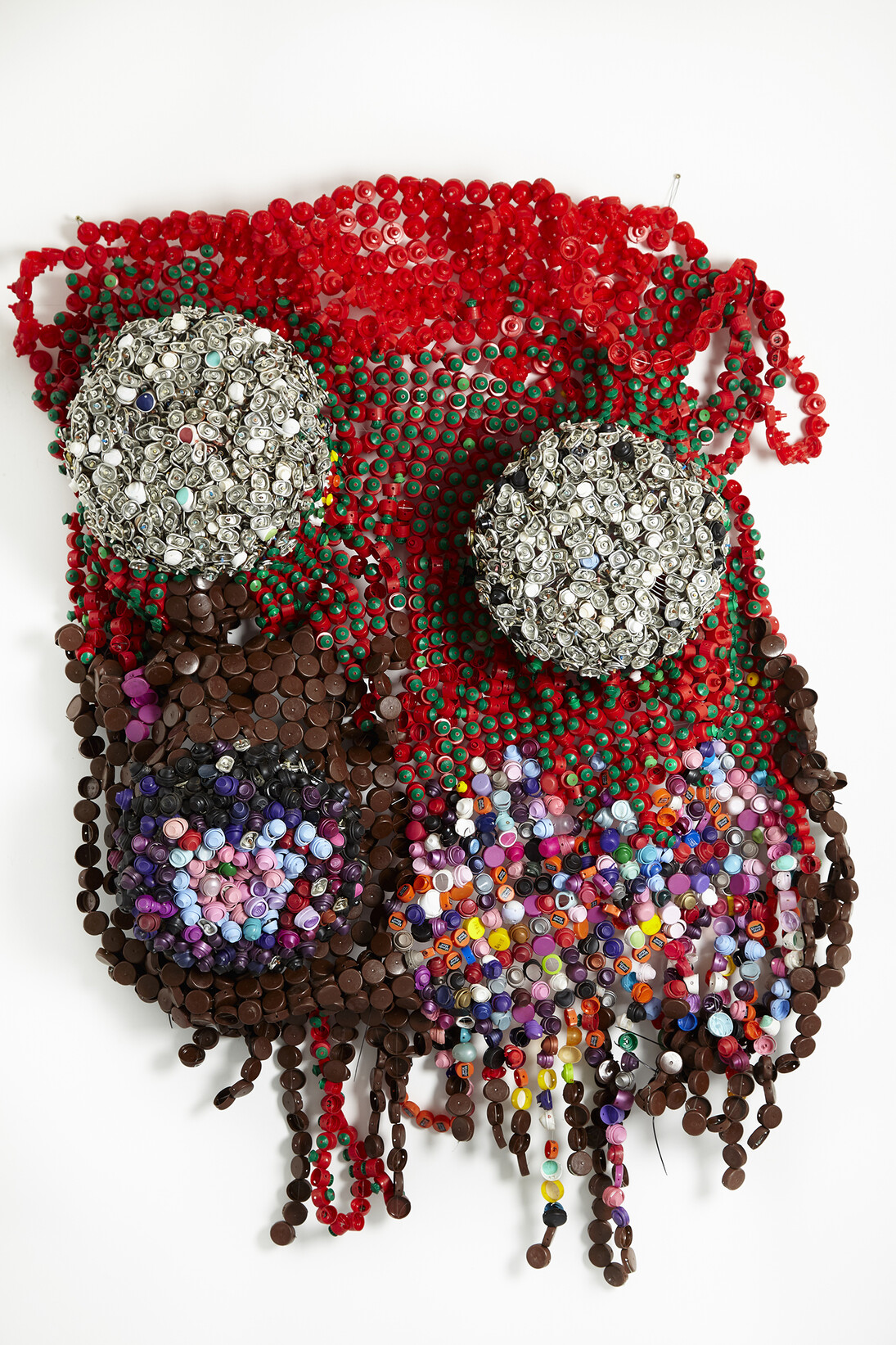 Moffat Takadiwa, Smell of foreign policy, 2015, Found bottle caps and spray tops, 170 x 145 x 30cm, Copyright the artist, courtesy Tyburn Gallery