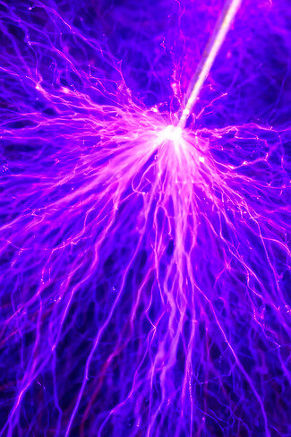 The intricate dance of electricity illustrates Tesla's groundbreaking principles, which laid the foundation for modern wireless technology