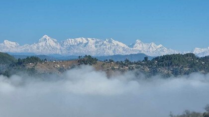 Spectacular view of snow clad Himalayan peaks from Dhamas Village, India 