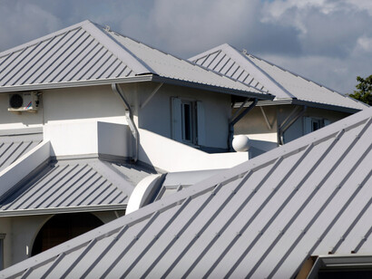 Metal shingles on a house roof
