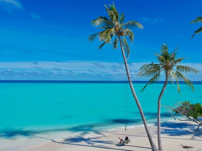A swing by the sea, reflecting the serenity that comes with an island life in the Philippines