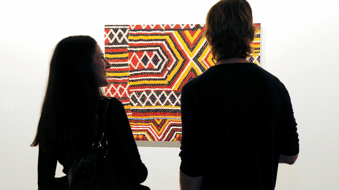 Frank Selby, MAT, 2014 at American Contemporary booth, Art Los Angeles Contemporary, January 29–February 1, 2015, The Barker Hangar, Santa Monica, on opening night. Photo by Angela Weiss/Getty Images. Courtesy of Getty Images/Art Los Angeles Contemporary.