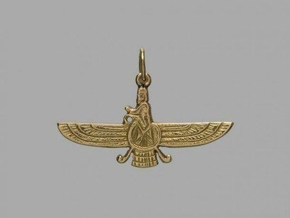 Modern gold pendant showing the Zoroastrian winged figure, fravashi/farvahar, which symbolises the immortal spirit of each human being that defends the material world against evil. Private Collection. © V.S. Curtis