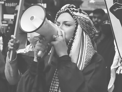 Woman in white hijab and red long sleeve shirt, Saturday Protest For Palestine May 22, 2021, London, UK