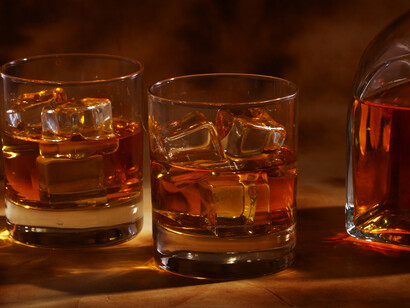 Bourbon is a type of barrel-aged American whiskey made primarily from corn