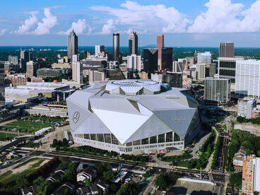 Mercedes-Benz Stadium which is an architectural landmark in Atlanta, symbolizing the innovation shaping today's sporting experiences