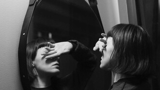 A woman finds it difficult to stare at her existence in the mirror as she's experiencing a mid mid-life crisis