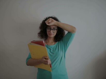 A woman in step 1 of trying to resolve her difficult situation by assessing what she is trying to avoid