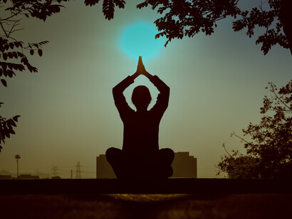A woman doing Yoga practice. Exercising daily can help you to improve your mood. You can set certain fitness goals which you can meet regularly