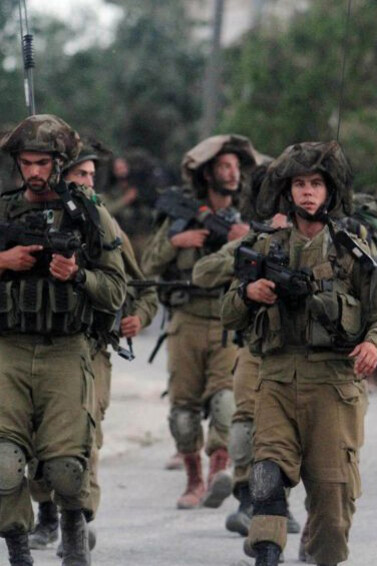 Israeli soldiers patrol near Ramallah