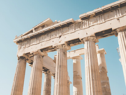Discover the timeless allure of ancient Athens amidst its sunlit ruins, where the iconic Erechtheion building stands as a testament to Greek antiquity—a captivating destination for history buffs and travelers alike