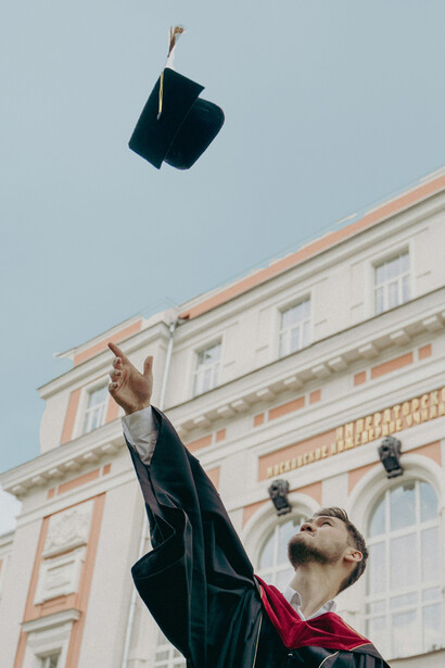 A university graduate representing the flawed nature of modern education