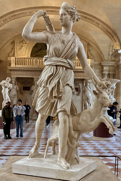 The Diana of Versailles is a Roman marble statue of the goddess Diana (Artemis), depicting her mid-stride with a deer, and is believed to be a copy of a lost Greek original from the 4th century BCE