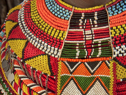 Bright, colourful beads in detail, reflecting the importance of colour in expressing heritage