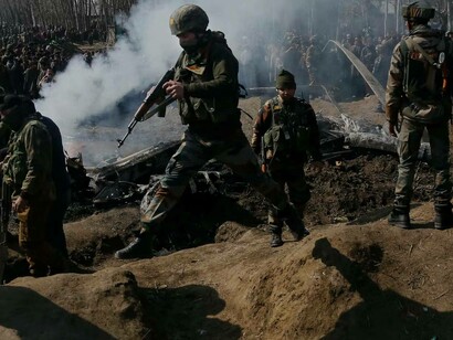 Soldiers in the Kashmir region are heavily armed and protected in their efforts to keep order in such a vulnerable area