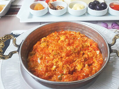 A tantalizing plate of menemen is artfully showcased on the table