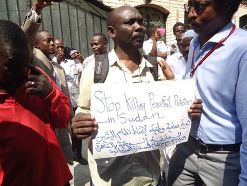 Abdel Rahman Siddiq Hashim protesting in front of the Sudanese Embassy in Cairo