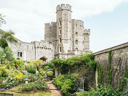 A tower overlooking a garden from the residence of the House of Windsor, in the county of Berkshire, England