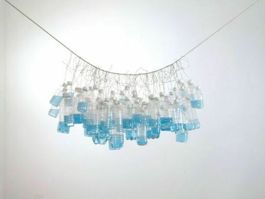 It Seemed a Beautiful Day, 2002, Plastic bottles with plastic caps, water, food dye, wire, rope, Bottles: 23 x 48 x 23 inches (58.4 x 121.9 x 58.4 cm); overall dimensions variable, Collection of the San Francisco Museum of Modern Art. Purchased through the In/Site Fund and the James Wilson Trust in memory of Michael Moran. Photograph by Adam Reich