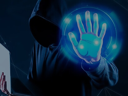 A cybersecurity expert confidently holds a computer in one hand, while the other hand gestures a resolute stop sign, symbolizing their vigilant stance against potential digital threats